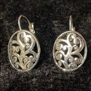 Pretty silver tone hanging loop style earrings